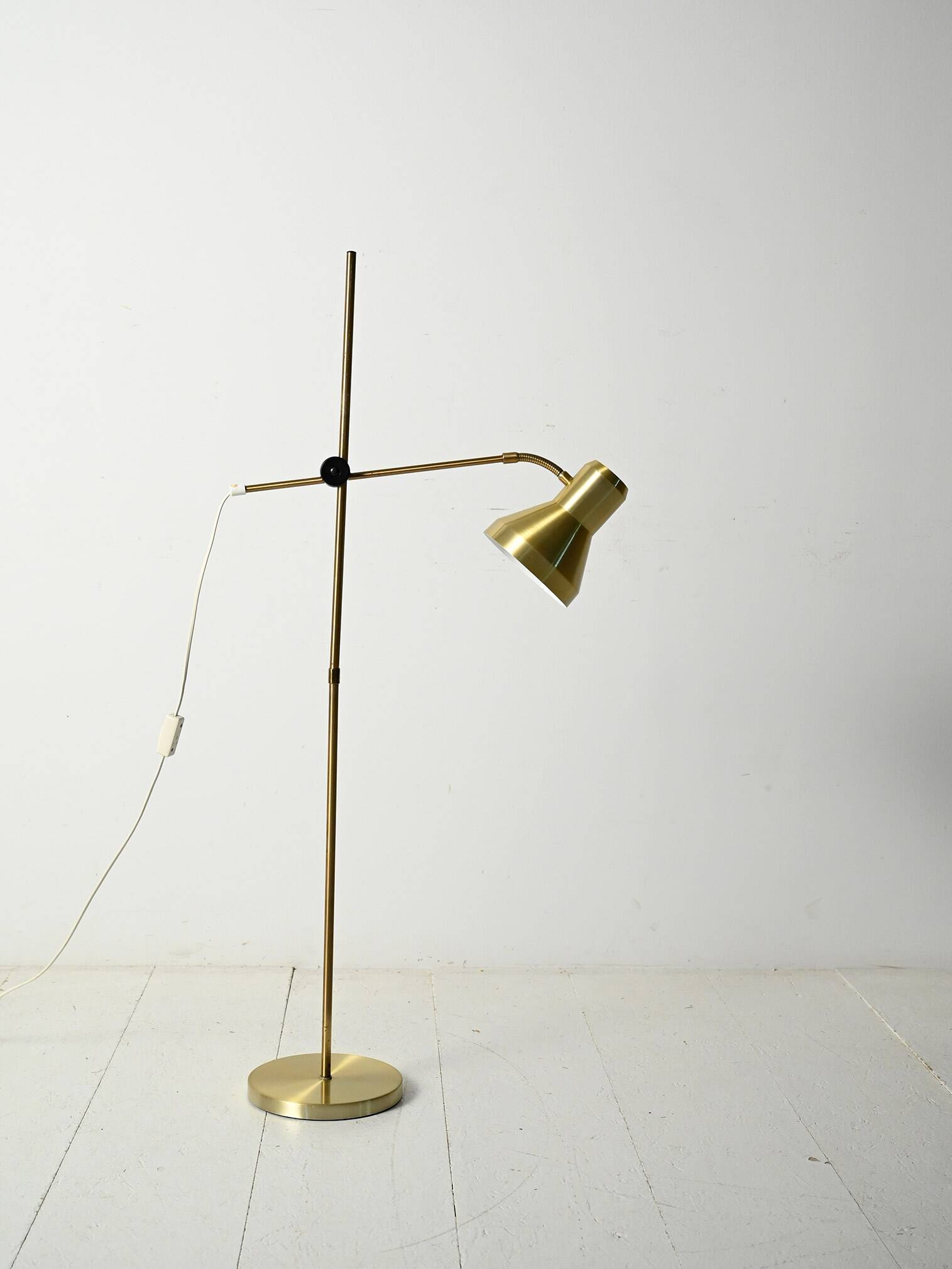 Scandinavian brass floor lamp with adjustable arm
