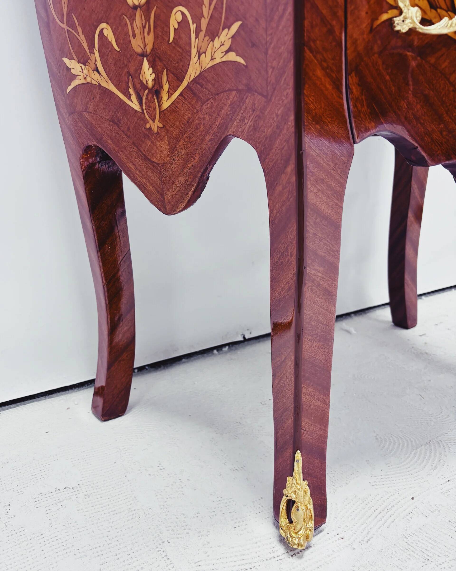 Marquetry chest of drawers with marble top in Louis XV style