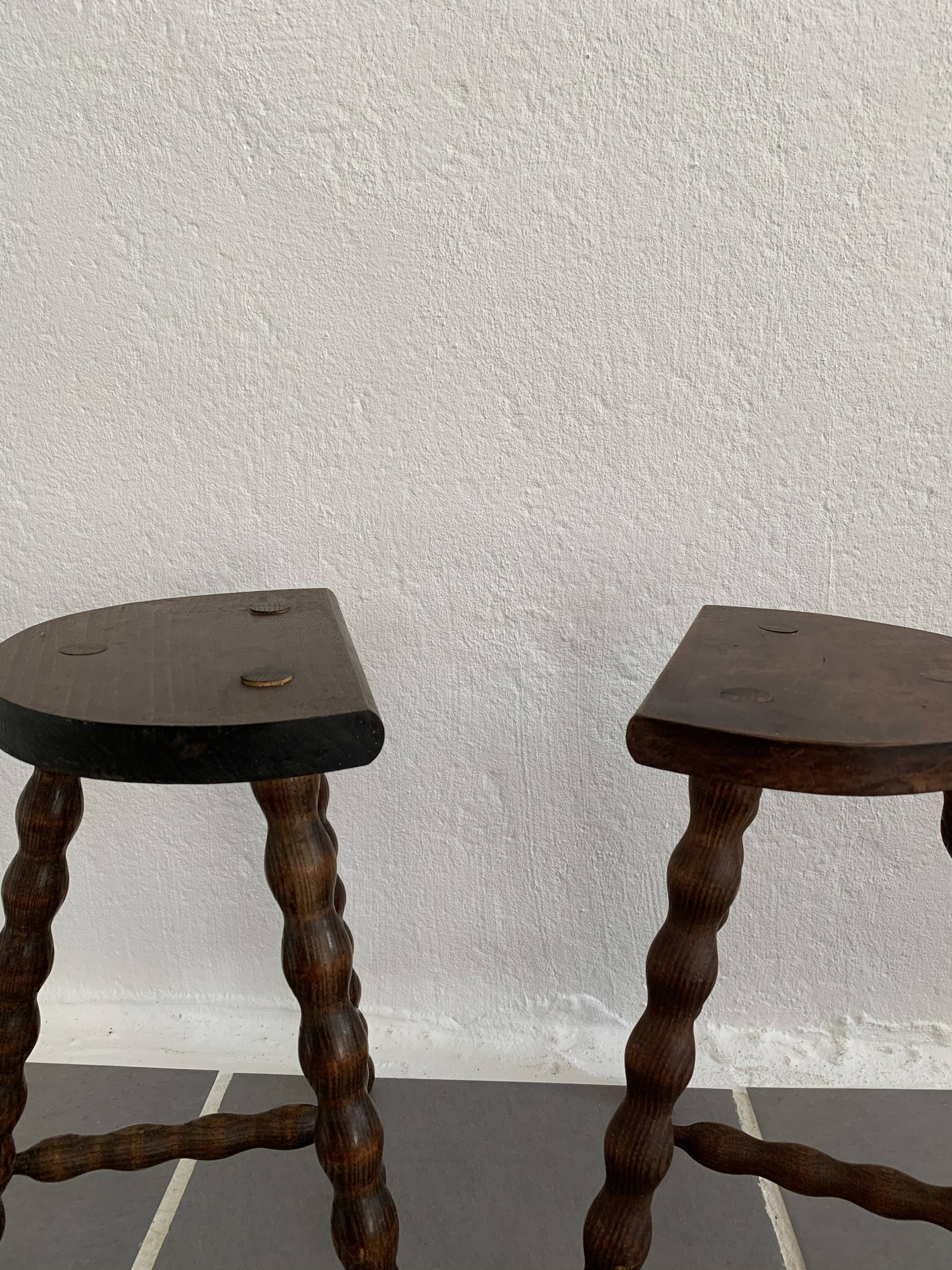 Pair of tripod stools turned wood