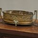 Neoclassical cache-pot in patinated brass, 19th century.