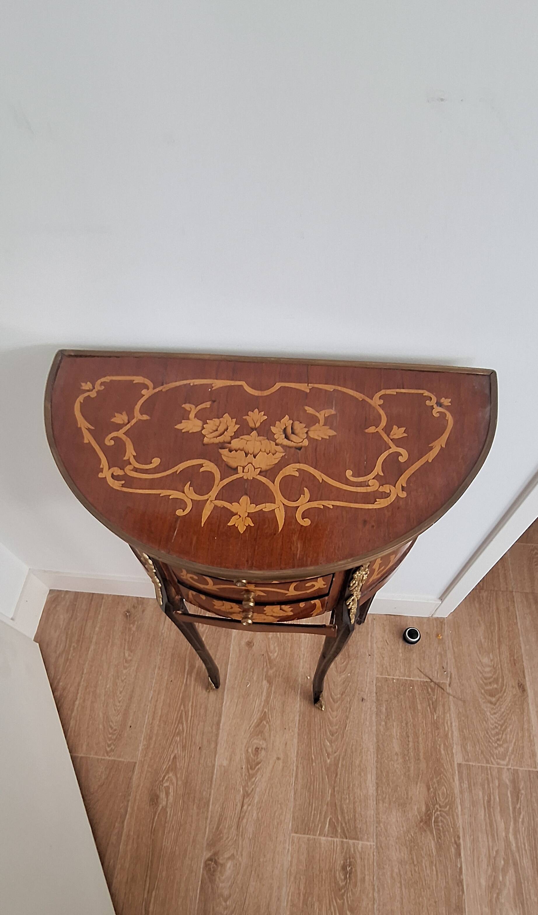 Louis XV style demi-lune consoles