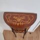 Louis XV style demi-lune consoles