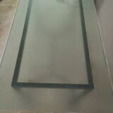 Table plateau en verre et pieds en fer forgé