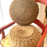 2 round caramel cushions in hand-pleated velvet
