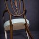 Paire de fauteuils en bois sculpté de style néoclassique, début XIXe