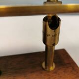 Fuga wall lamp in solid brass and teak wood was designed by Jo Hammerborg for Fog & Mørup in 1966.