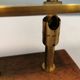 Fuga wall lamp in solid brass and teak wood was designed by Jo Hammerborg for Fog & Mørup in 1966.