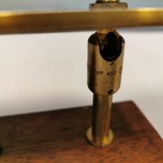 Fuga wall lamp in solid brass and teak wood was designed by Jo Hammerborg for Fog & Mørup in 1966.