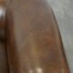 2 Chesterfield armchairs in dark brown cowhide