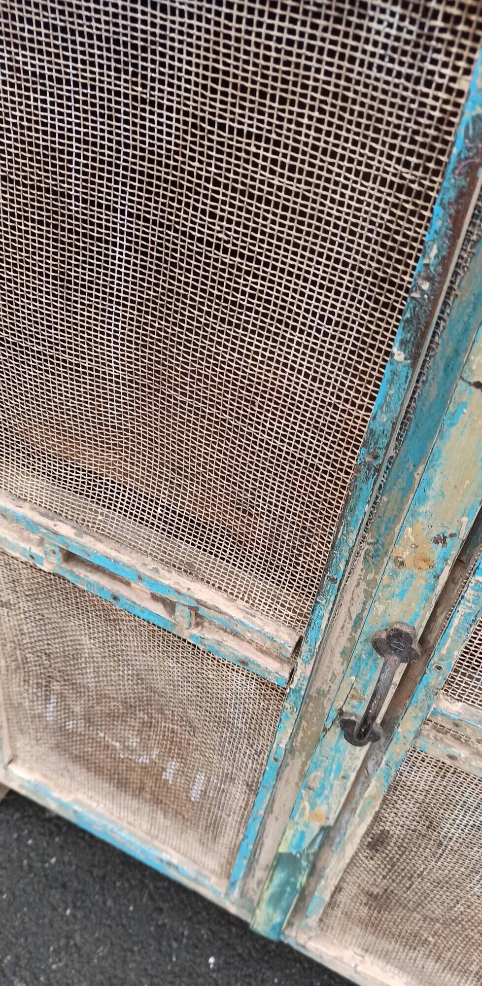 Small pantry buffet in old wood with mesh doors