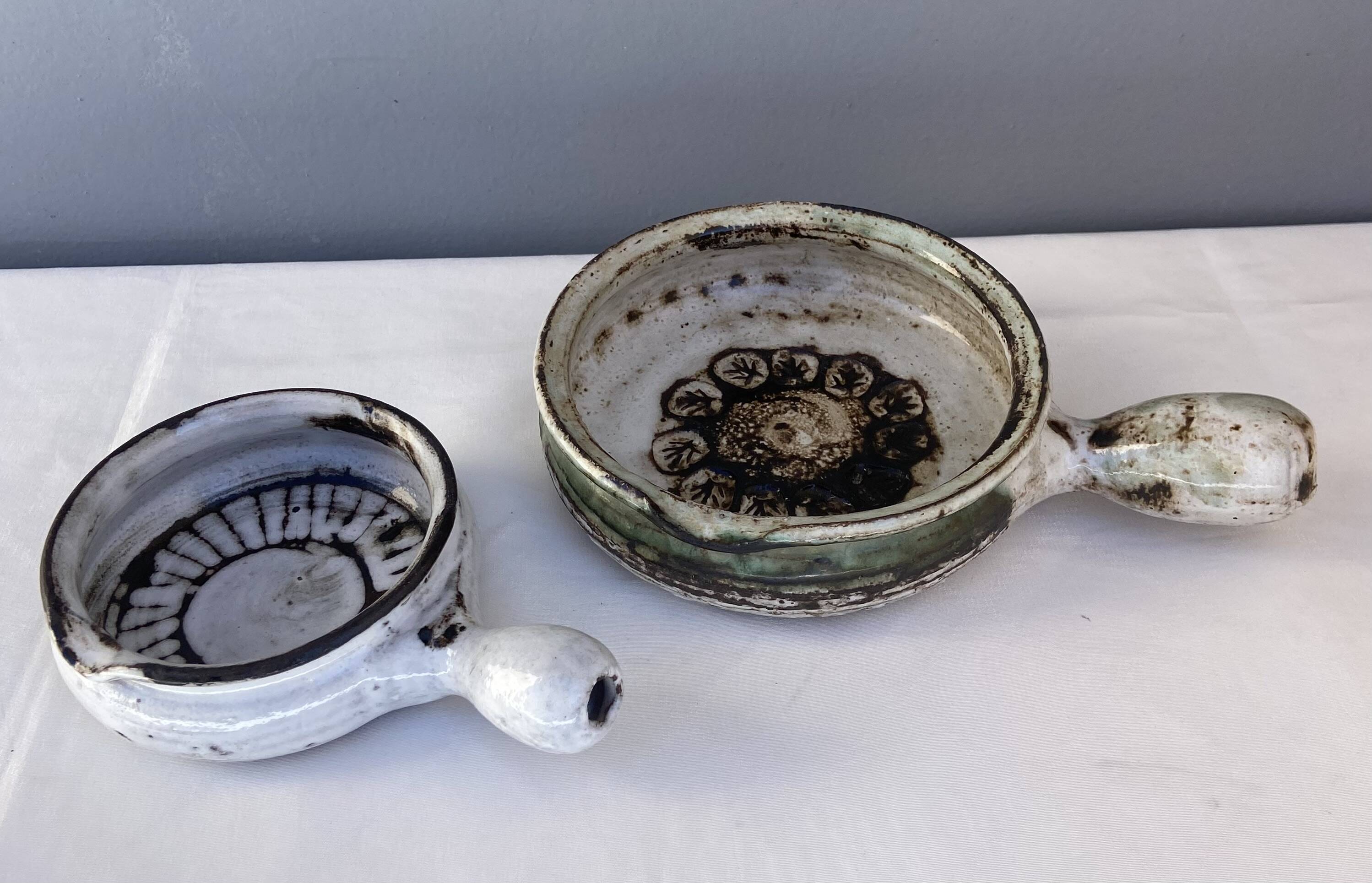 Two fondue pots by Albert Thiry