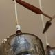 Scandinavian chandelier "Cascade" from the 1960s in brass, teak, and smoked glass.