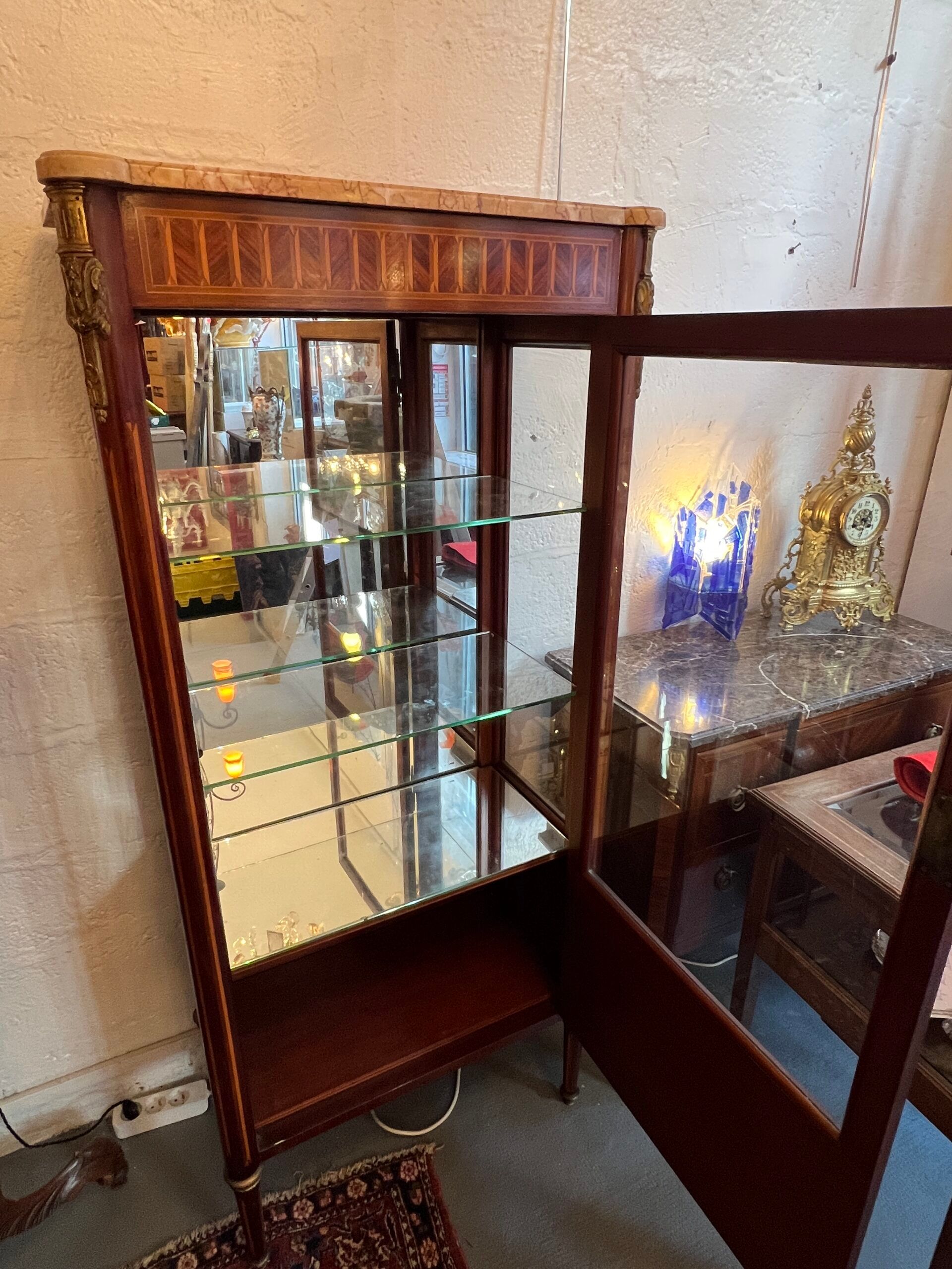 Louis XVI style display case in veneer marquetry, late 19th century