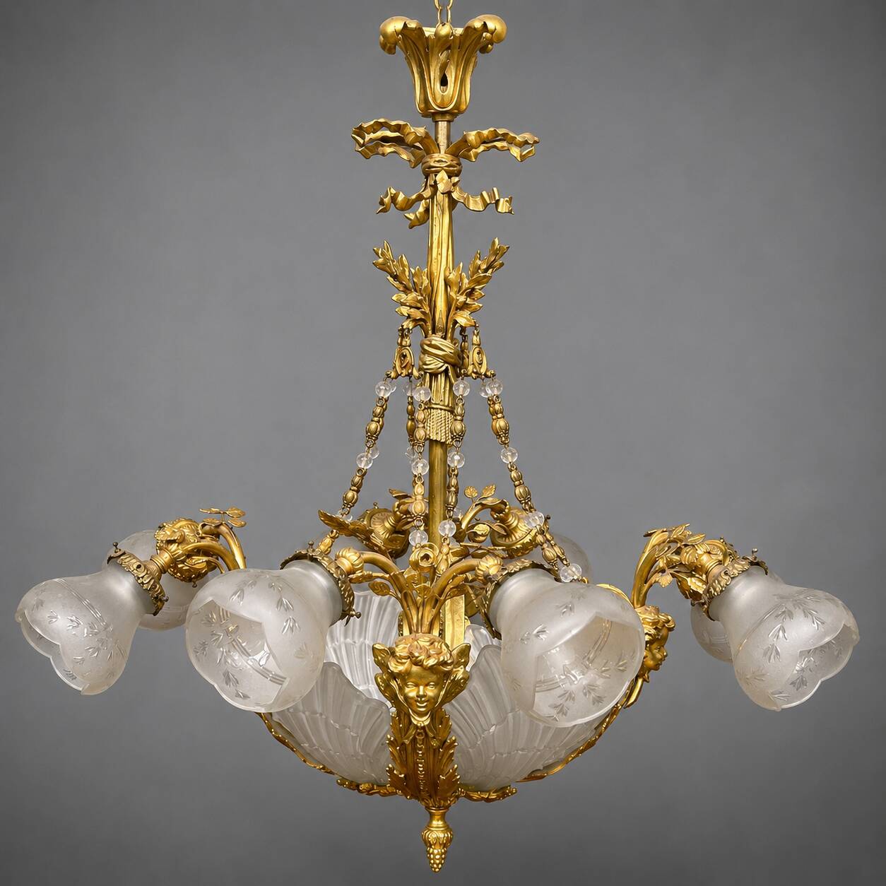 Golden bronze chandelier in Louis XVI style. 12 light points.