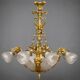 Golden bronze chandelier in Louis XVI style. 12 light points.