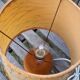 Light wood round foot laying lamp and old lampshade