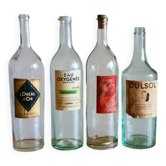 Four hairdresser bottles from 1940 to 1970