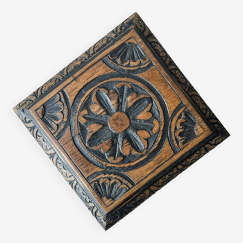 Old carved wooden trivet