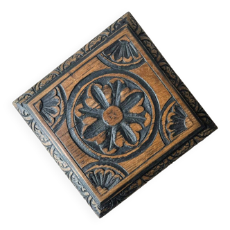 Old carved wooden trivet