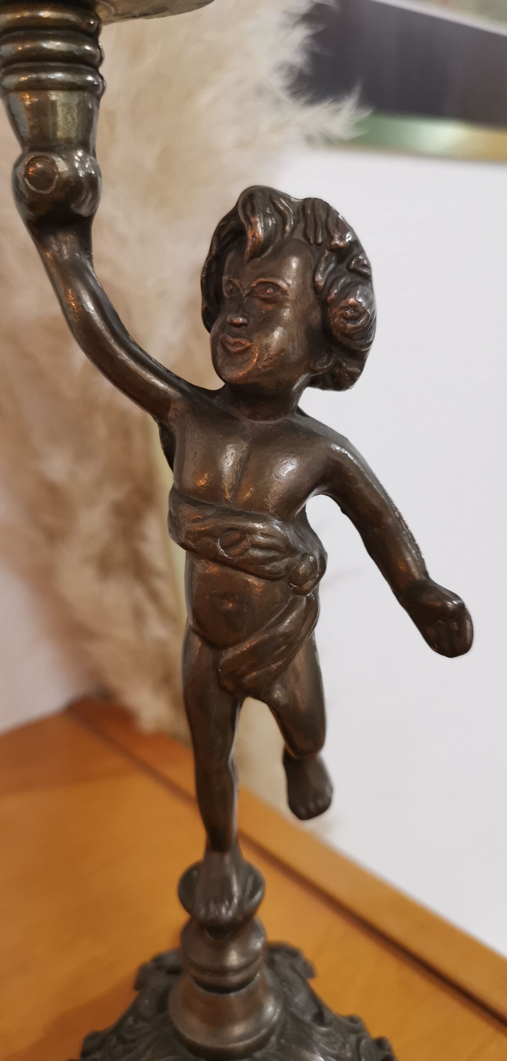 Pair of antique candlesticks in bronze and brass