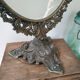 Old mirror on foot metal 30x46cm
