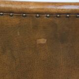 Cognac-colored sheepskin and wooden Art Deco design armchair