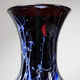 Large vintage purple art glass vase with silver glitter inclusions.