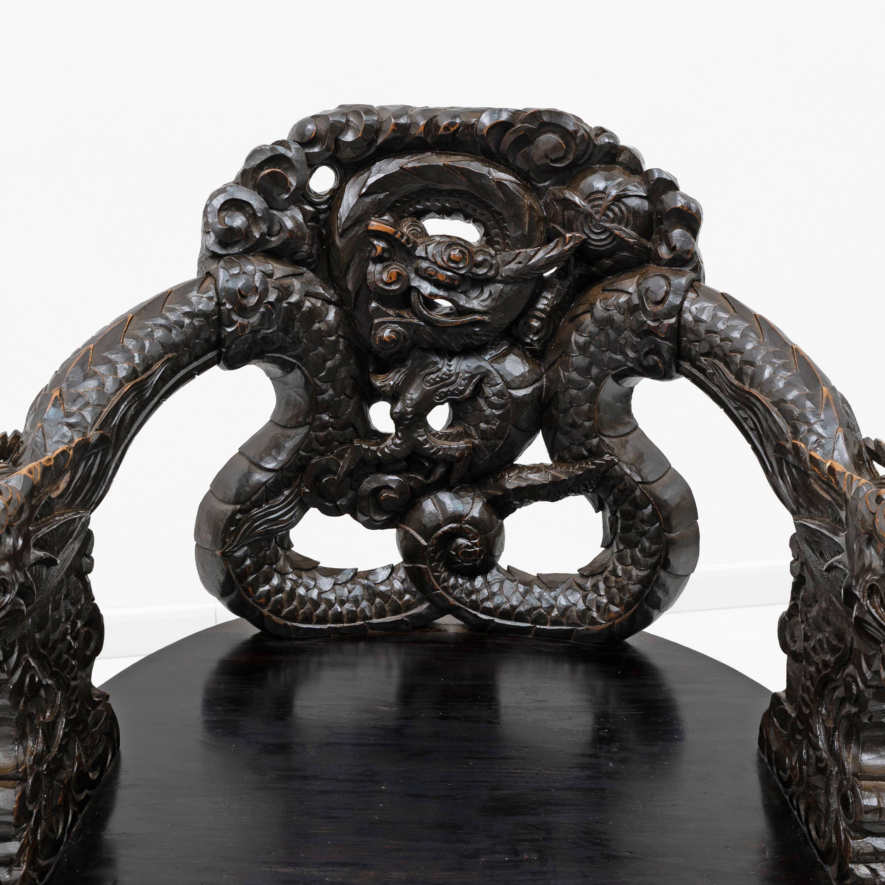 Pair of Chinese Qing Dynasty Carved Dragon Armchairs,Ebonized Hardwood,19th