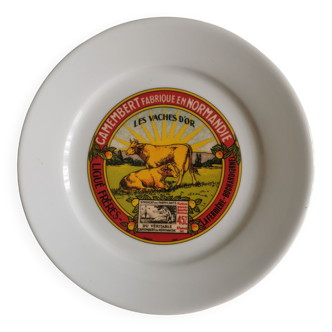 Assiette publicitaire Camembert Président. Porcelaine de Limoges - Apilco. Signée Yves Deshoulières.