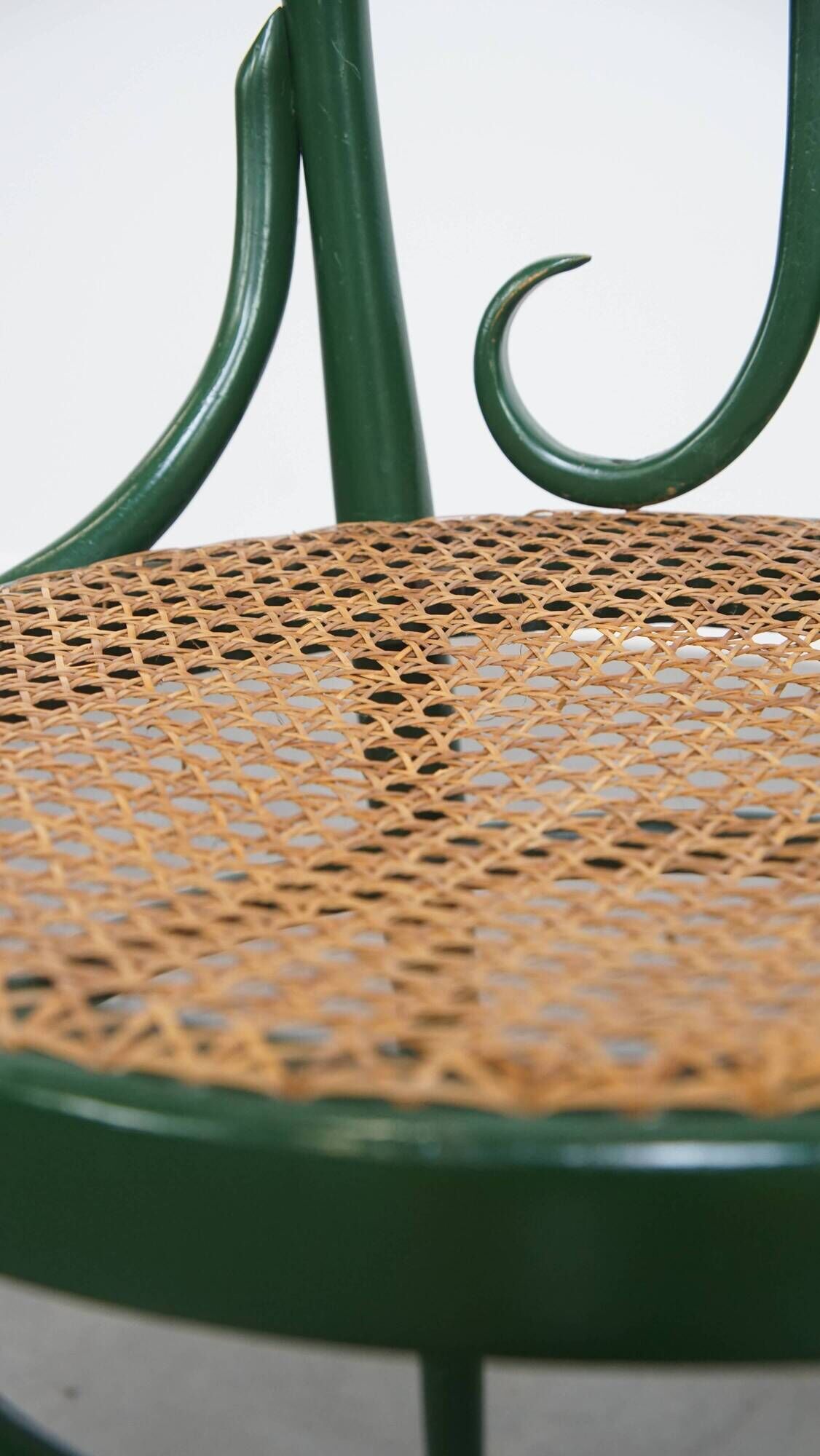 Vintage green bistro chair with woven reed seat
