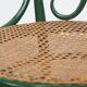 Vintage green bistro chair with woven reed seat