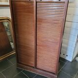 Double curtain binder in blond mahogany