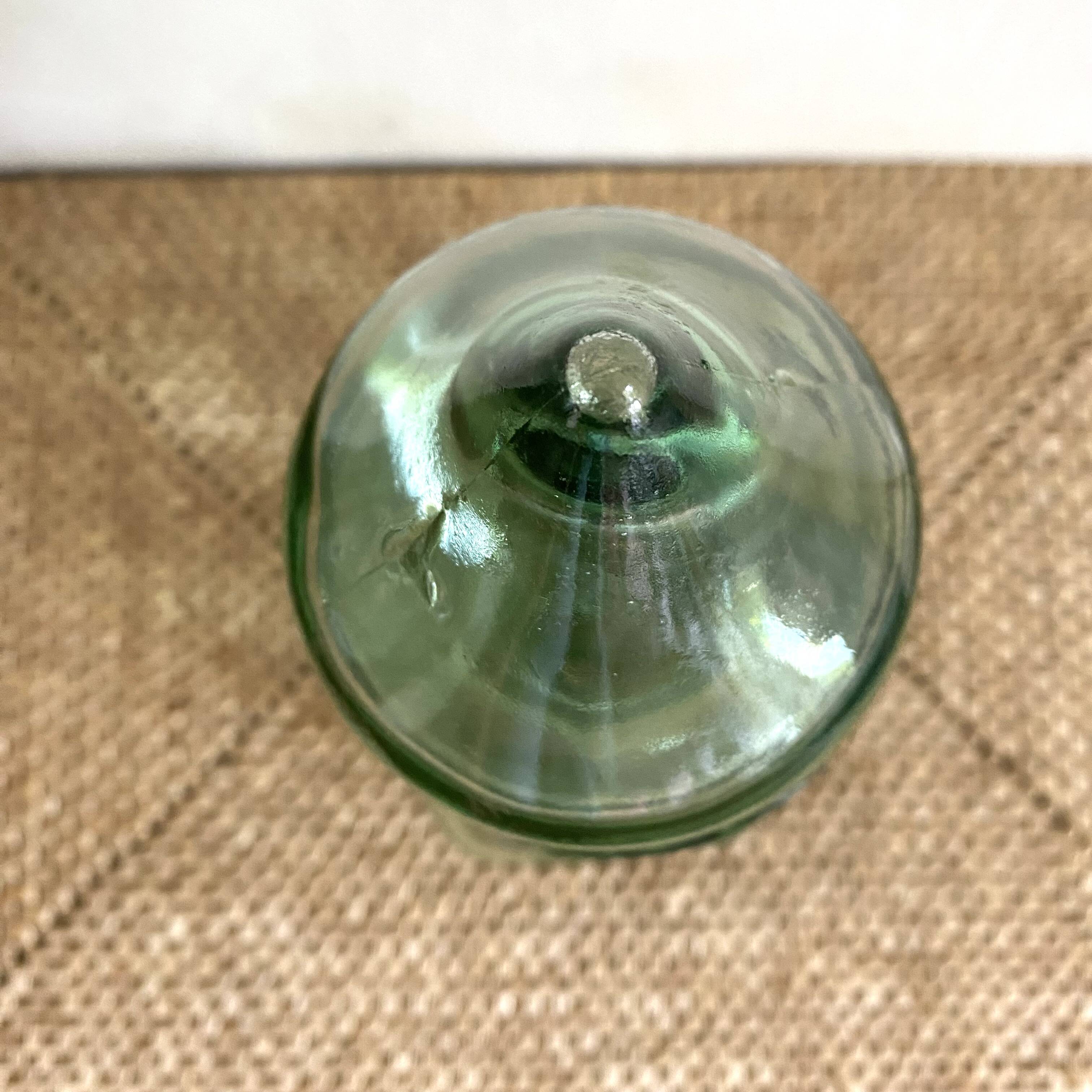 Vintage carafe in light green glass