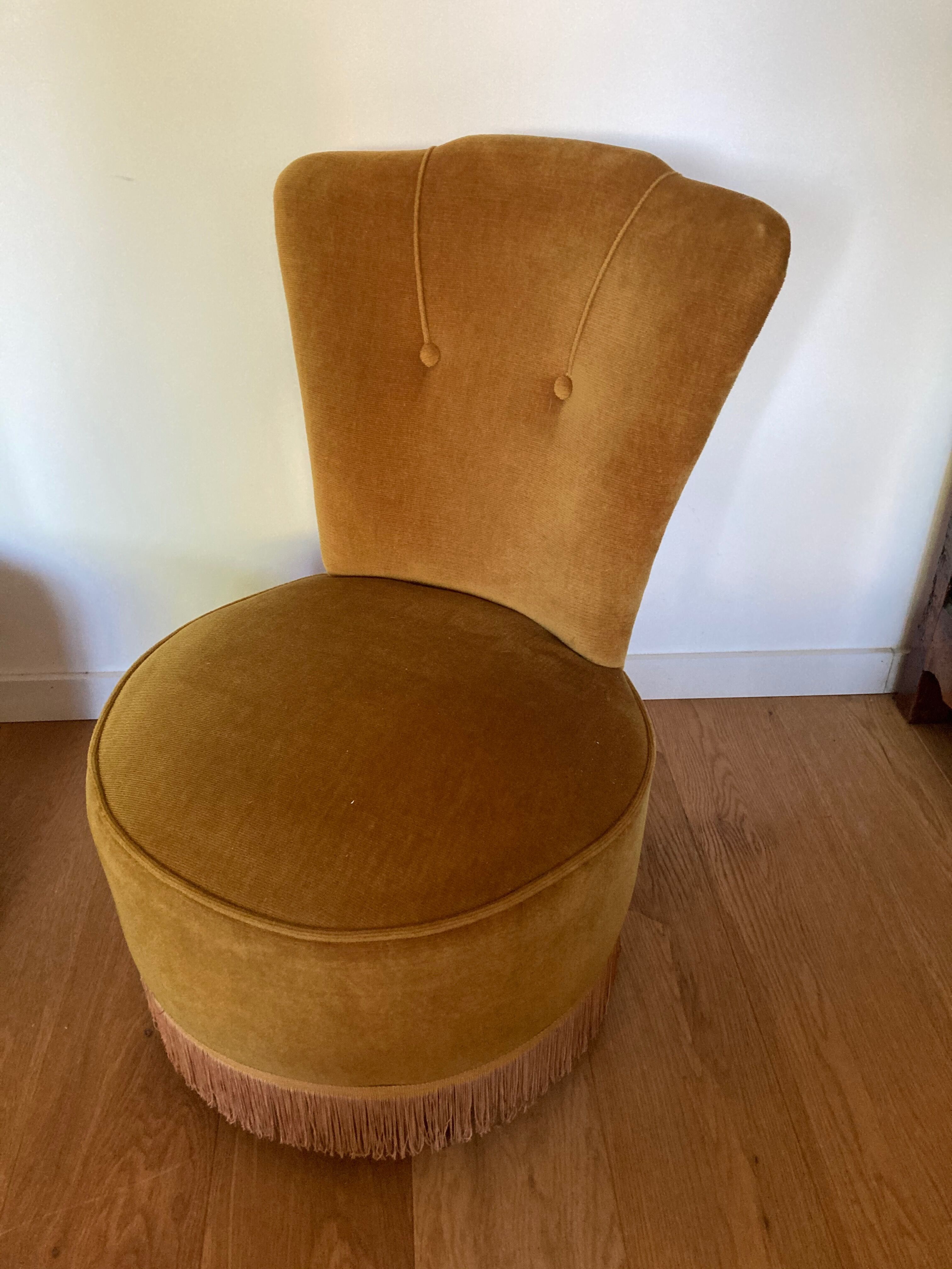 Pair of armchairs toad fringed .