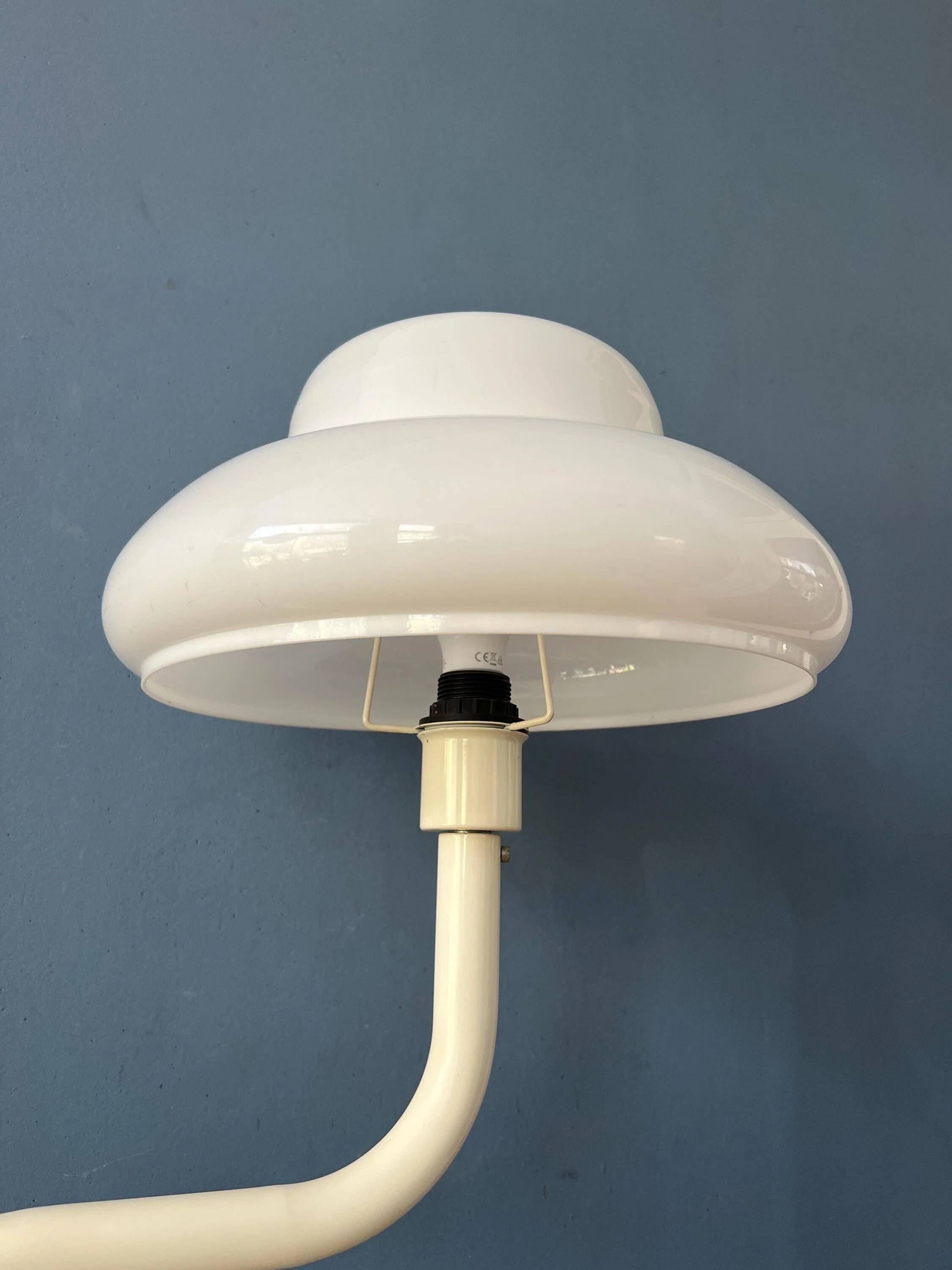 Mid-century mushroom floor lamp with a white plexiglass shade.