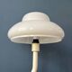 Mid-century mushroom floor lamp with a white plexiglass shade.