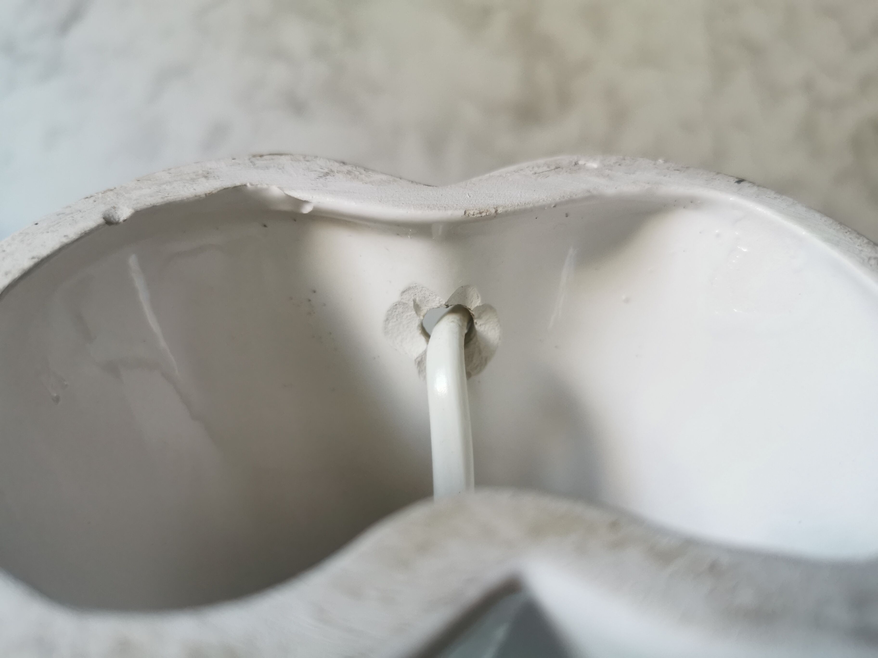 White ceramic hand lamp