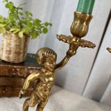 Pair of bronze “Cherubim” candlesticks