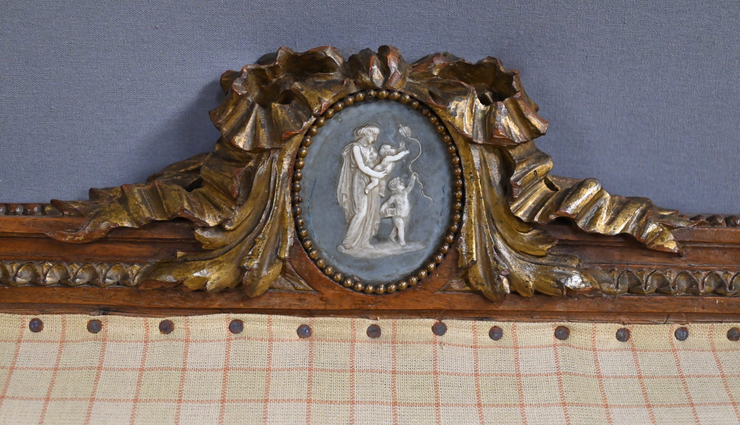 Wingback armchair in walnut, Louis XVI style – late 19th century