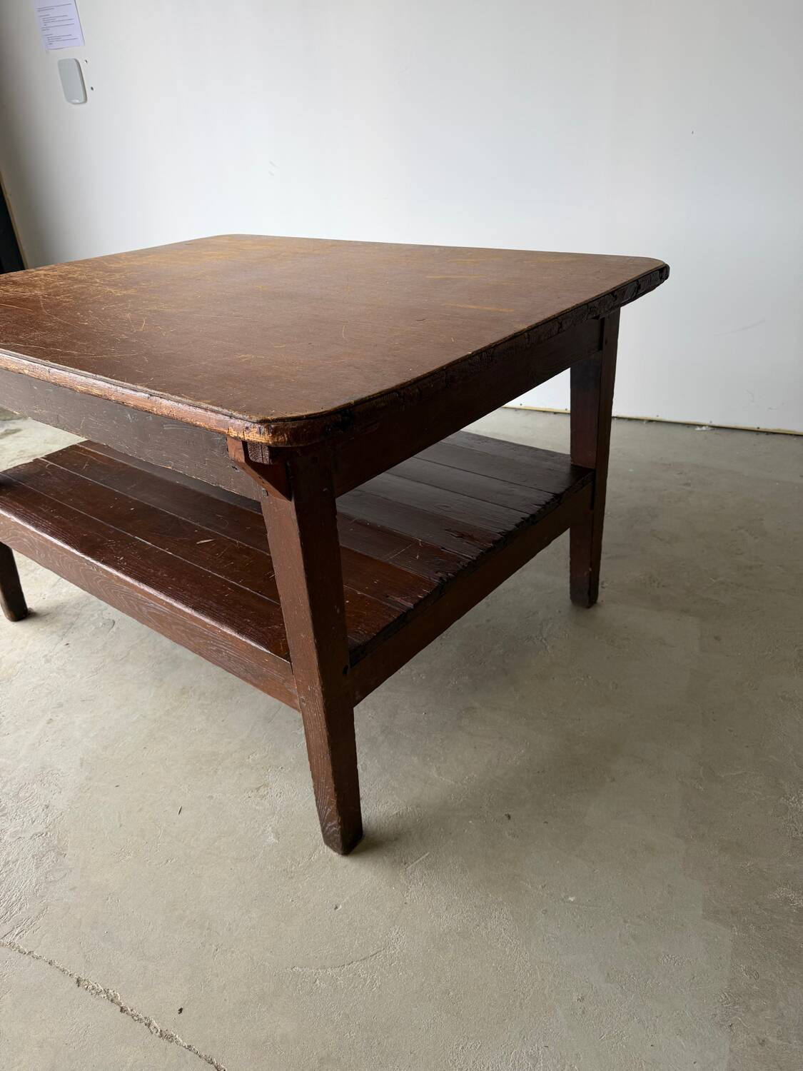 Antique draper's workbench / haberdashery table in solid wood from the early 20th century.