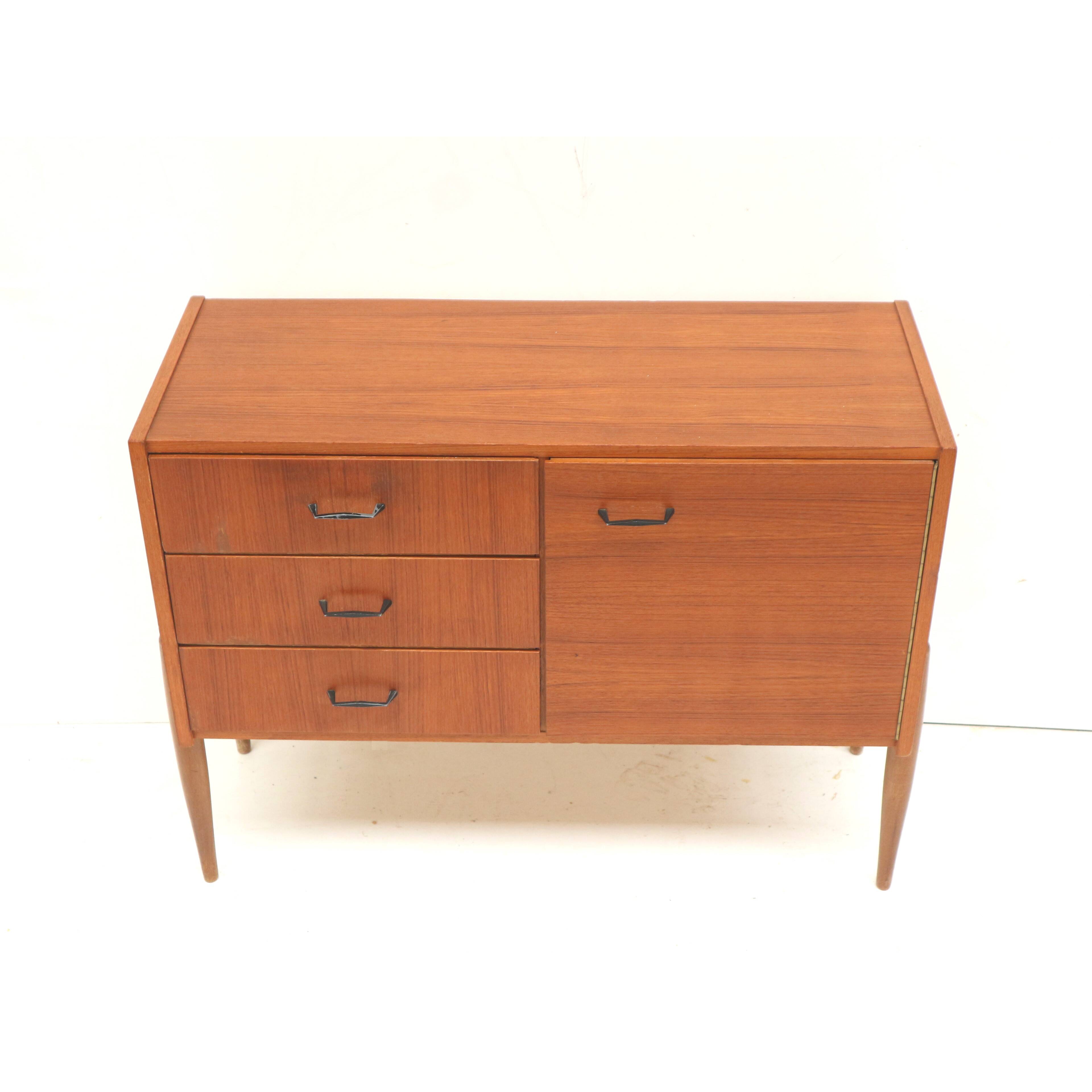 Vintage sideboard with drawers and door made in the 60s