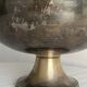 Large champagne bucket with patinated metal swan handles.