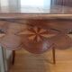 Walnut and marquetry table, 19th century.