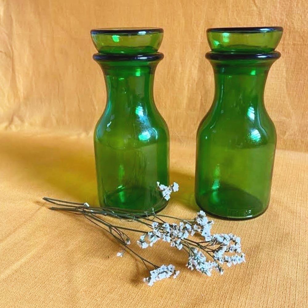 Green glass apothecary pots