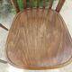 pair of dark bistro chairs, rounded backs, Baumann style
