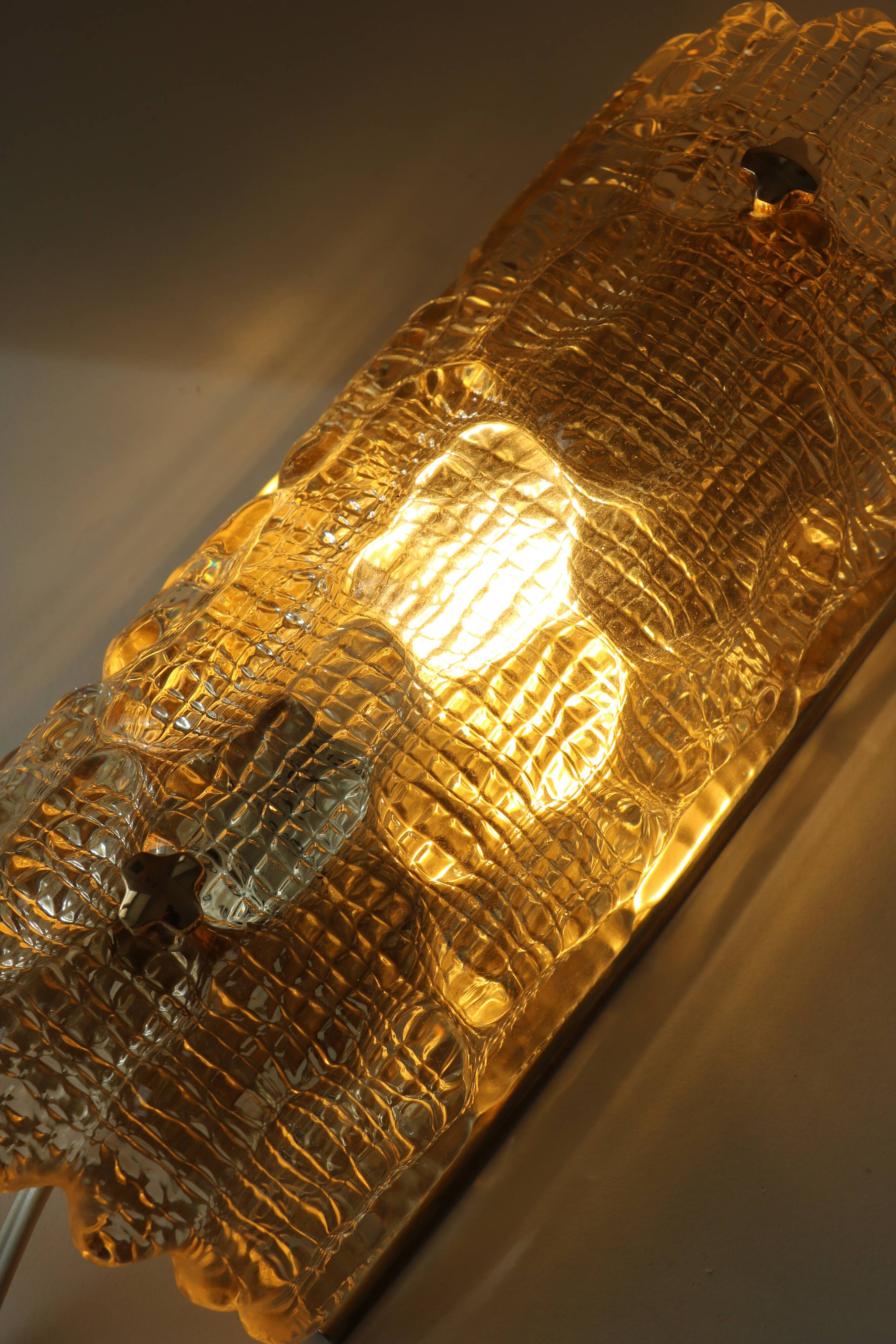 Glass and brass wall light by Carl Fagerlund for Orrefors, 1960.