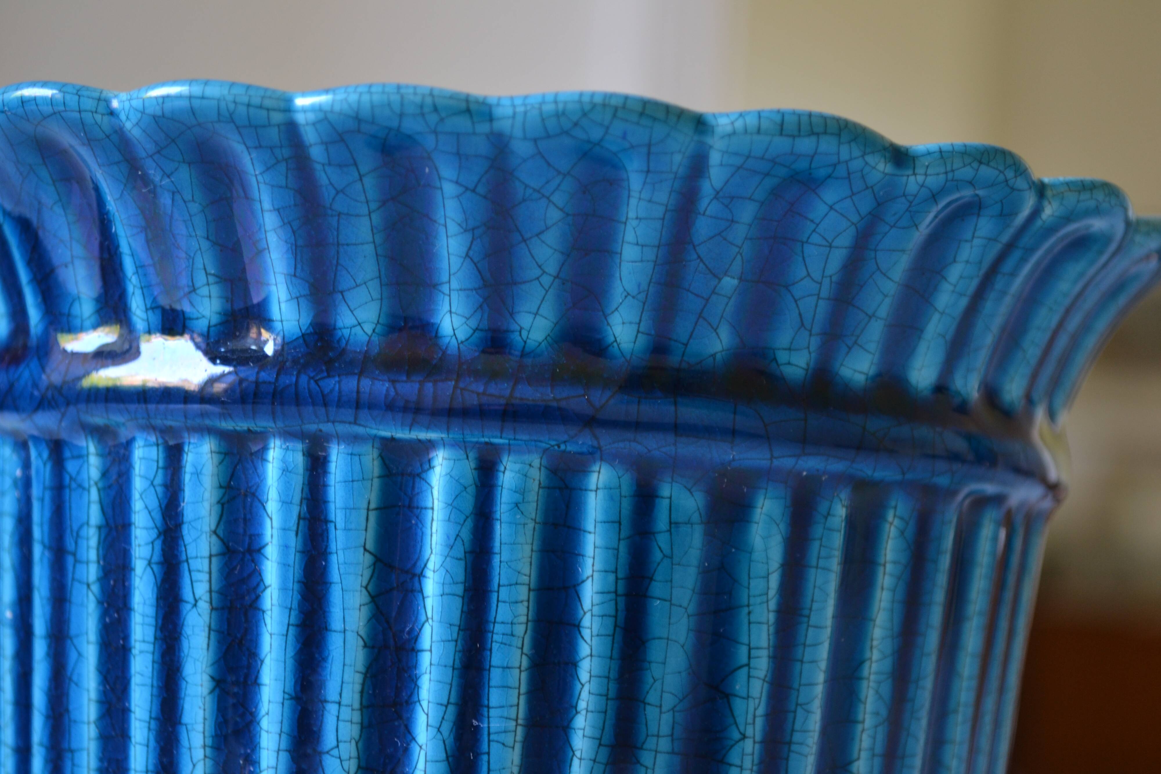 Cracked blue ceramic cache pot