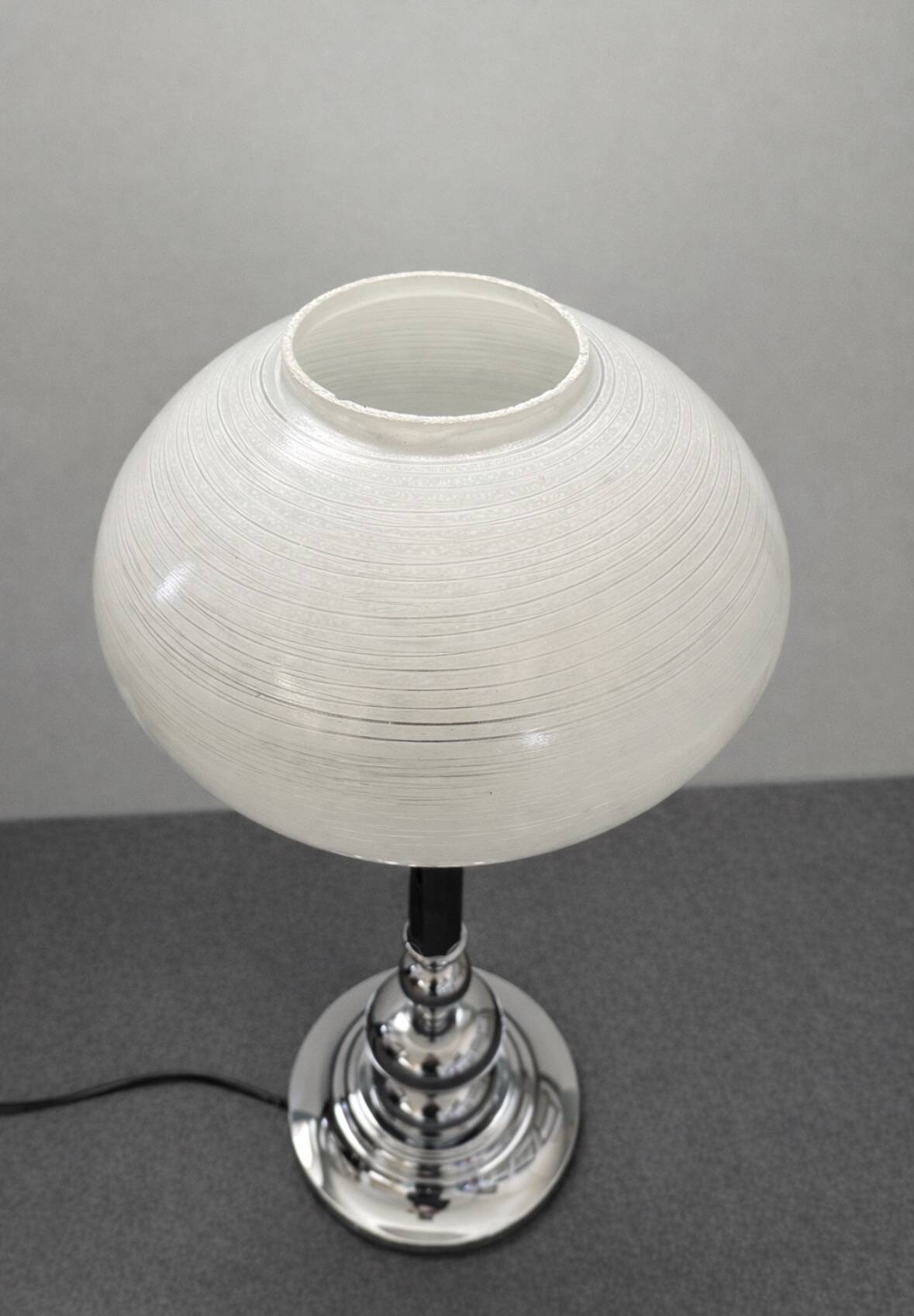 Large Art Deco table lamp, chrome base and satin glass globe.