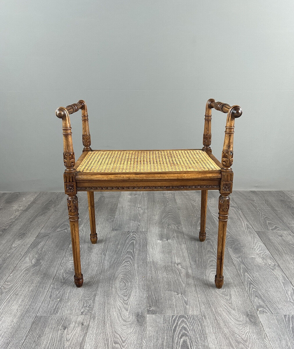 Banquette / tabouret en bois sculpté et cannage, XXe siècle