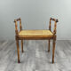 Banquette / tabouret en bois sculpté et cannage, XXe siècle